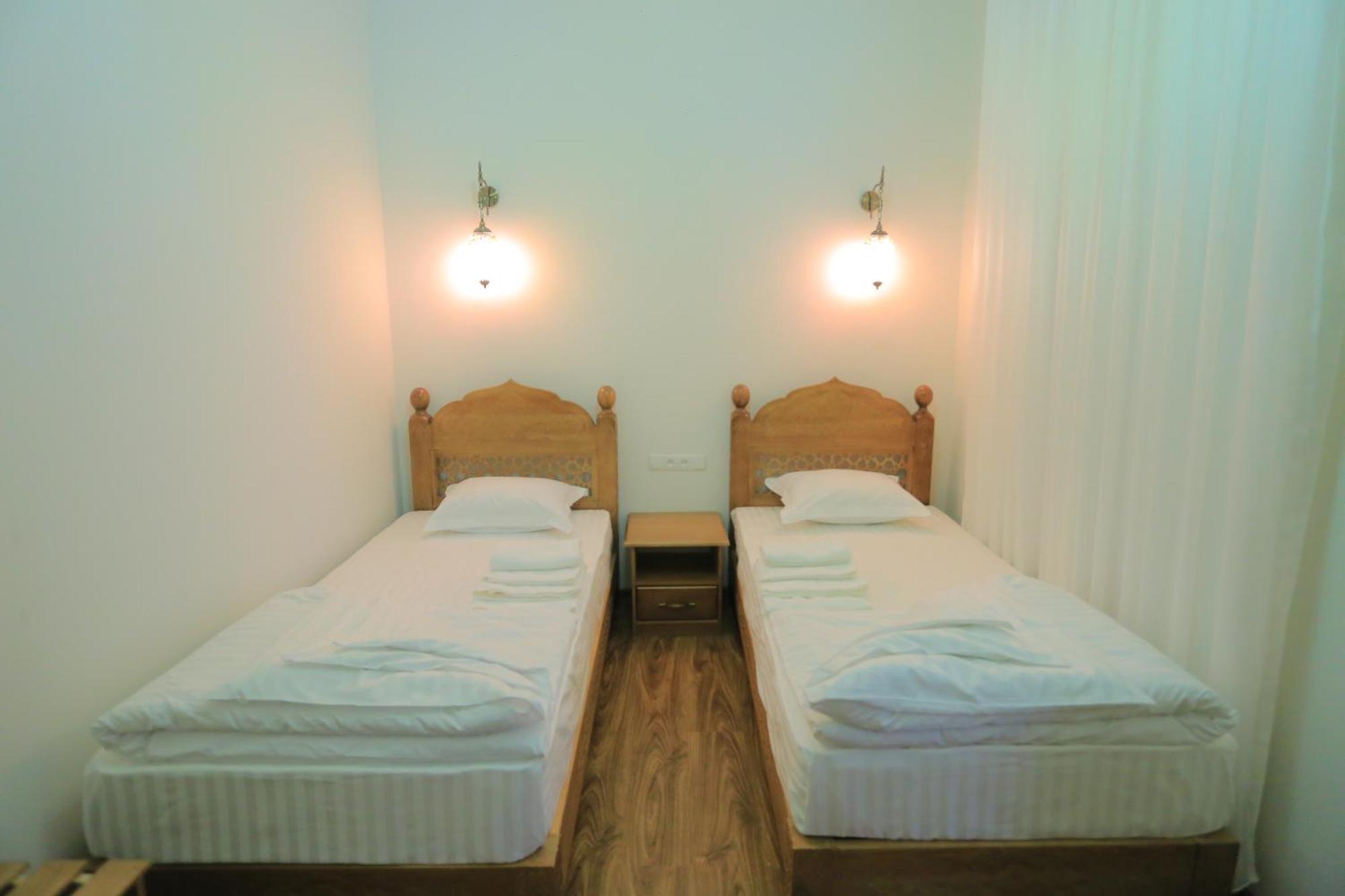 Guesthouse Muqaddam Buchara Buitenkant foto